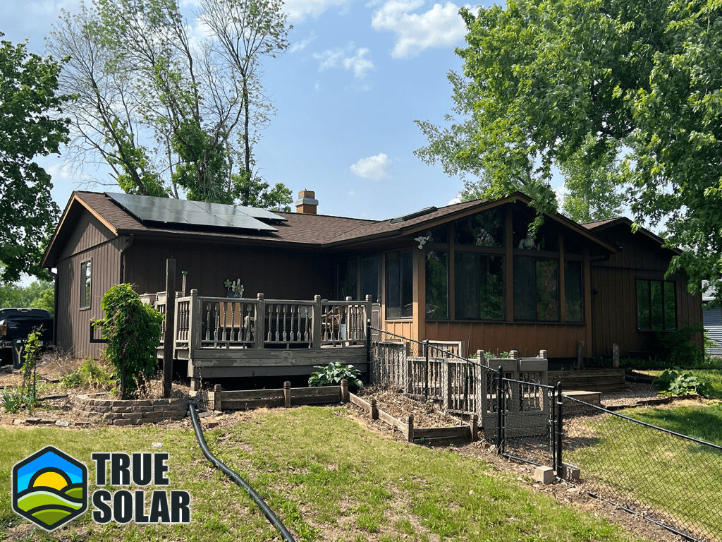 Photograph displaying a home solar installation in Iowa by True Solar, featuring a sleek arrangement of home solar panels on the rooftop, harnessing Iowa's abundant sunlight to generate green energy for the household.